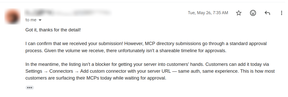 A May 26 email confirming that Anthropic received the submission and that it was going through the standard approval process; the sender's name, email address, and portrait are redacted